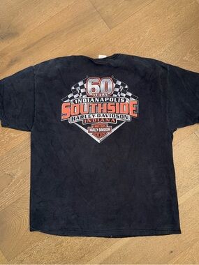 Harley-Davidson Black Tee with Orange 'Kicking Asphalt' Graphic